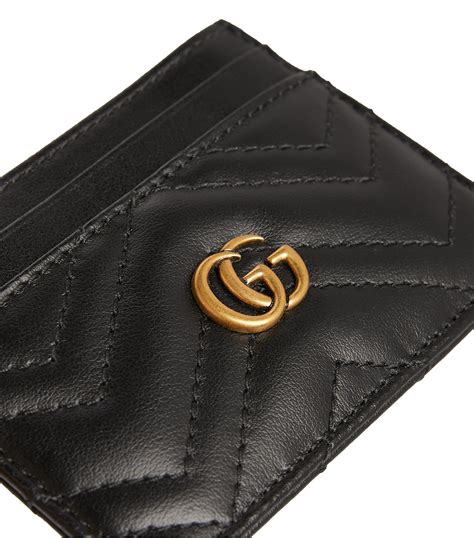 gucci black leather card holder.